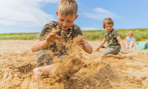 Children playing on Brora beach