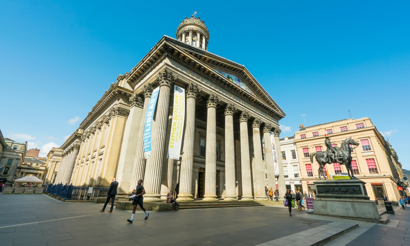 Looking towards Gallery of Modern Art in Glasgow with the equestrian Wellington Statue