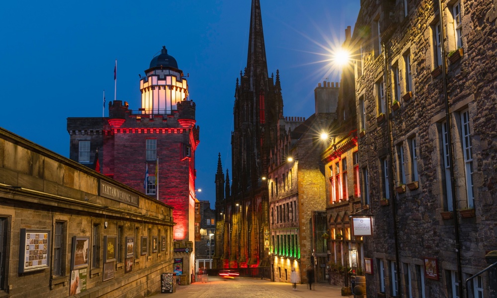 View at night down Castlehill to Camera Obscura & World of Illusions