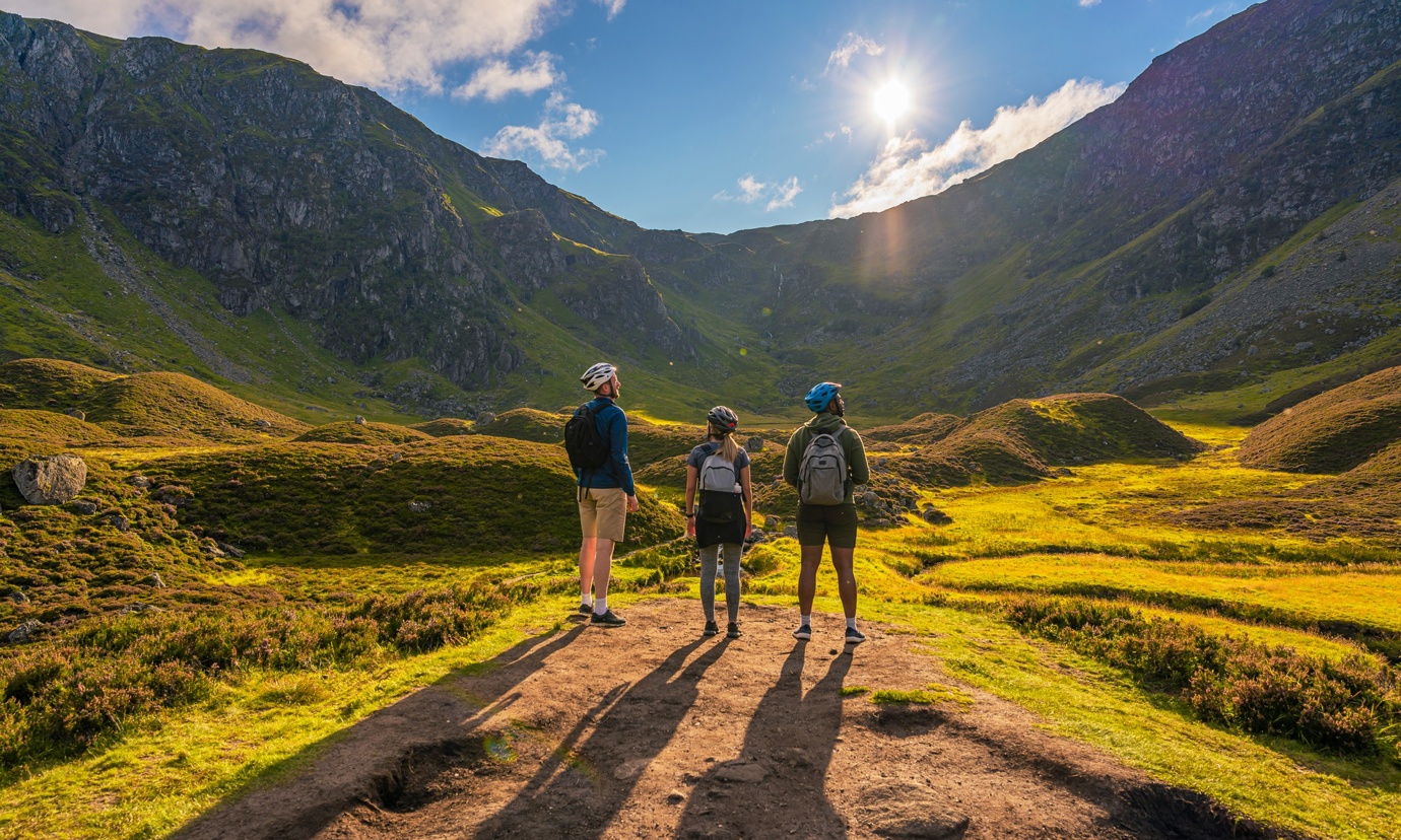 A group of friends explore Corrie Fee by bicycle